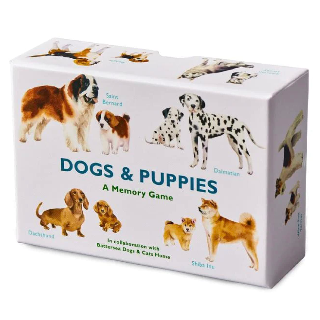 Memory game box featuring images of dogs and puppies on a white background