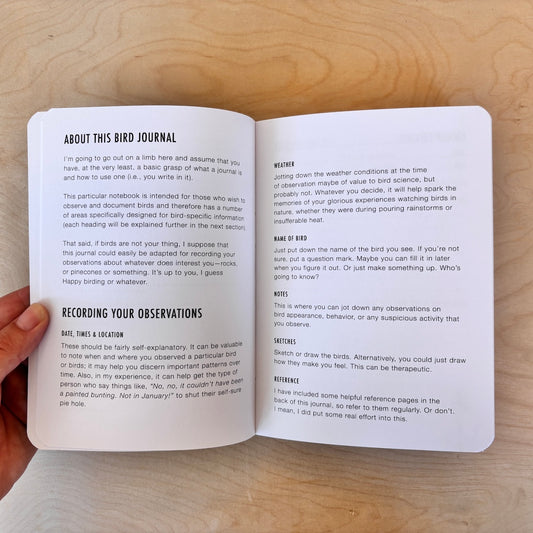 An open bird journal with an explanation on how to use the journal.
