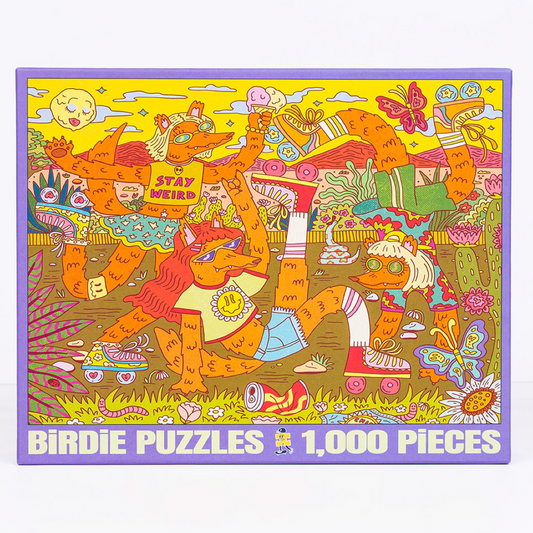 A square jigsaw puzzle box featuring a colorful psychedelic illustration of cartoon fox characters in a grassy scene, with the text 'BIRDIE PUZZLES 1,000 PIECES' along the bottom.