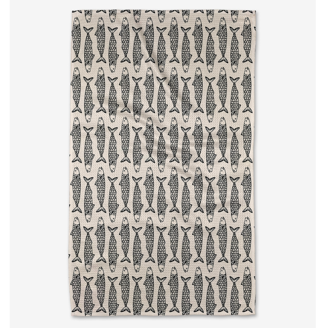 Patterned towel with fish design on a white background