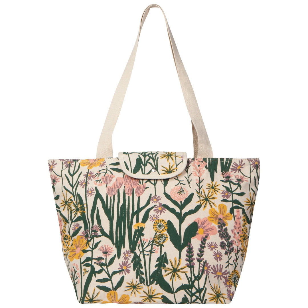 Floral patterned tote bag with beige straps on a white background