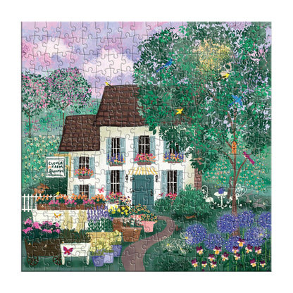 Jigsaw puzzle with a scenic house and garden design