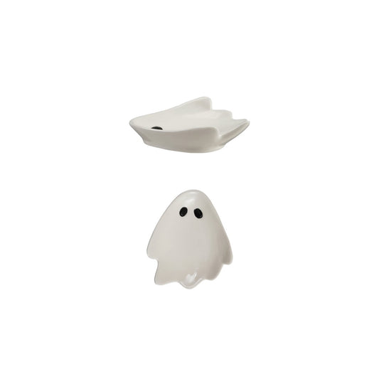 Two small ghost-shaped ceramic dishes with black eyes, shown on a plain white background.