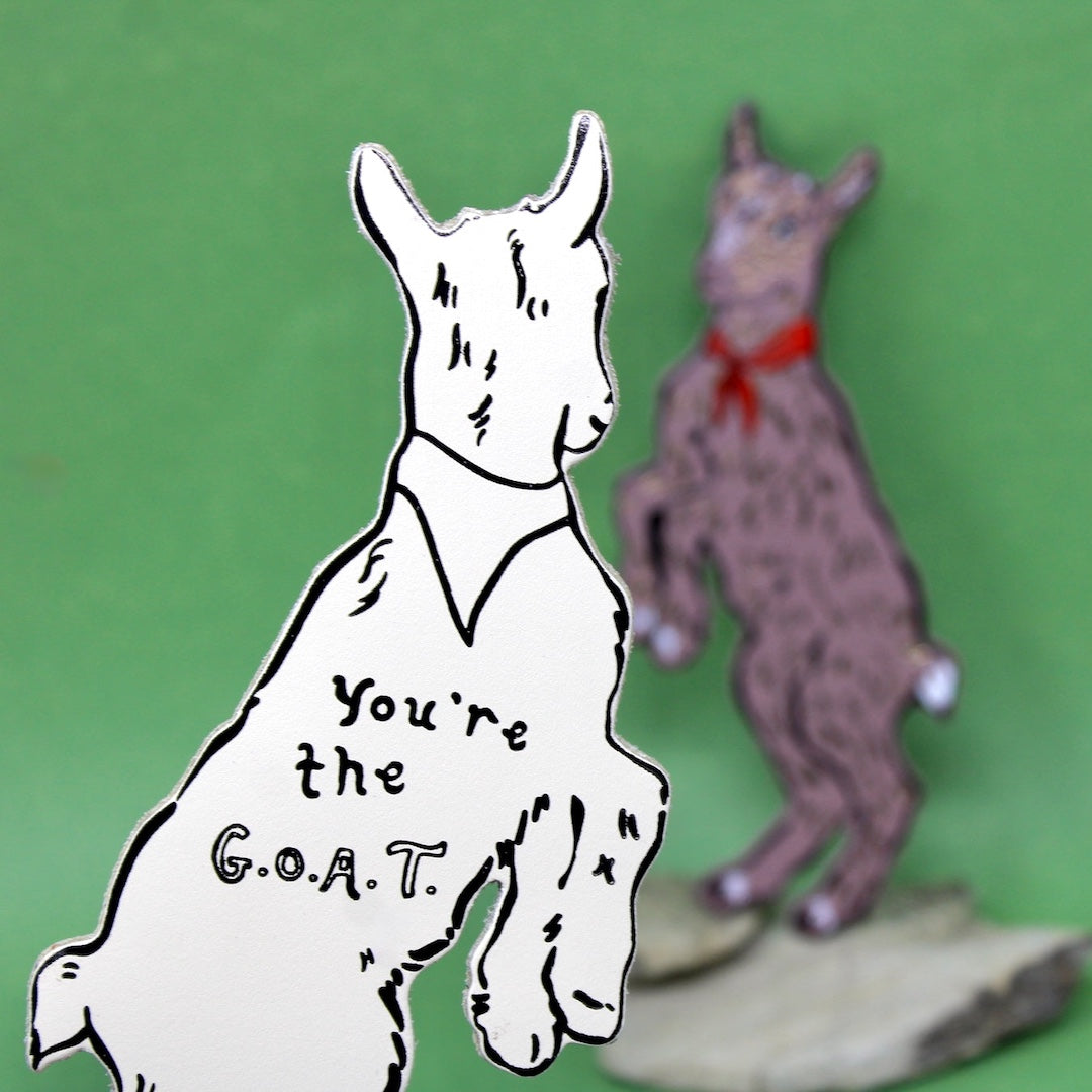 Leather bookmark goat with 'You're the G.O.A.T.' text 