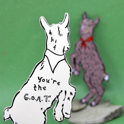 Leather bookmark goat with 'You're the G.O.A.T.' text 
