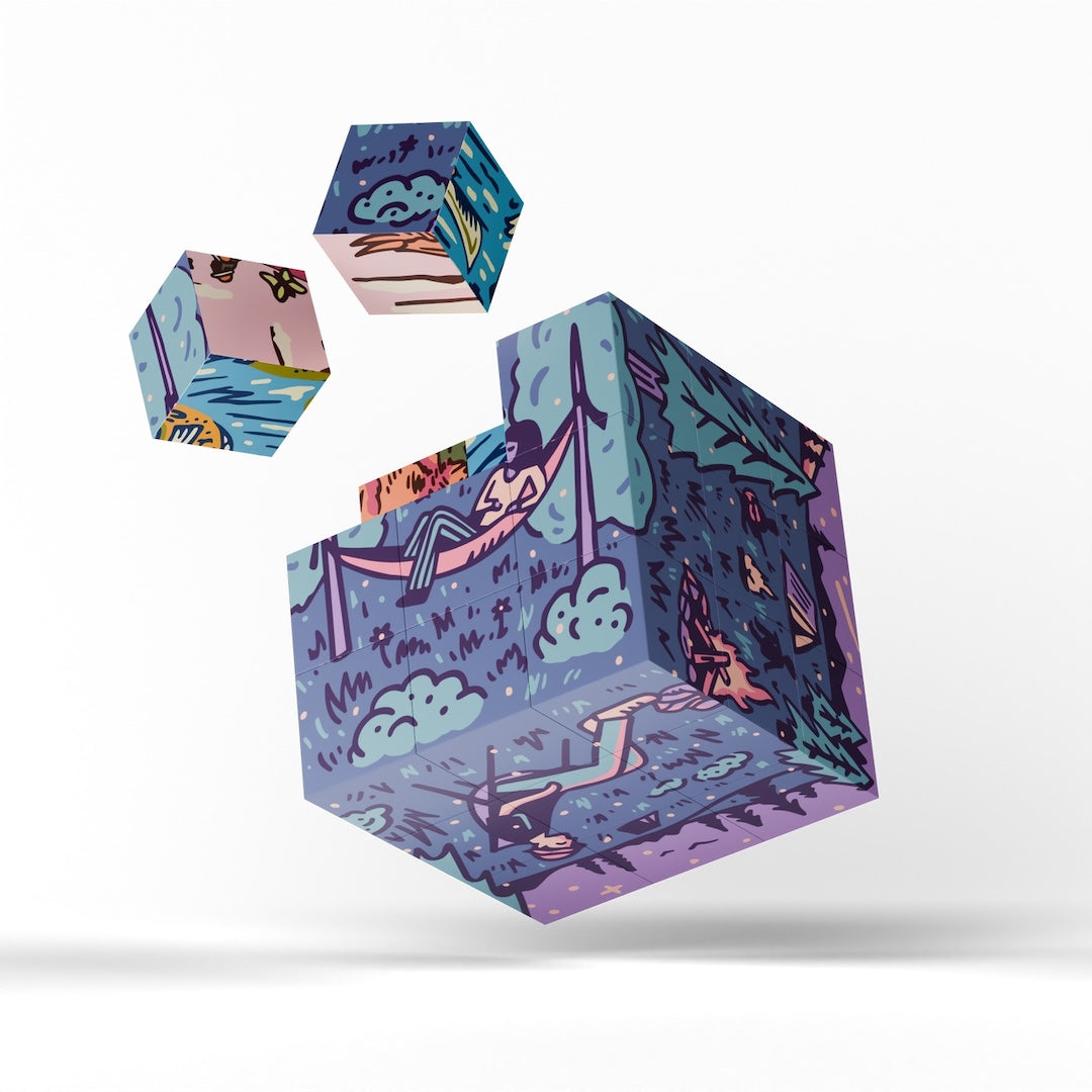 Three floating illustrated cubes with a whimsical scenic print, featuring purple, blue, pink, and teal tones, shown on a clean white background.