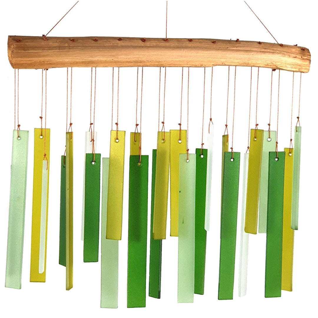 Colorful green glass wind chime with wooden base on a white background