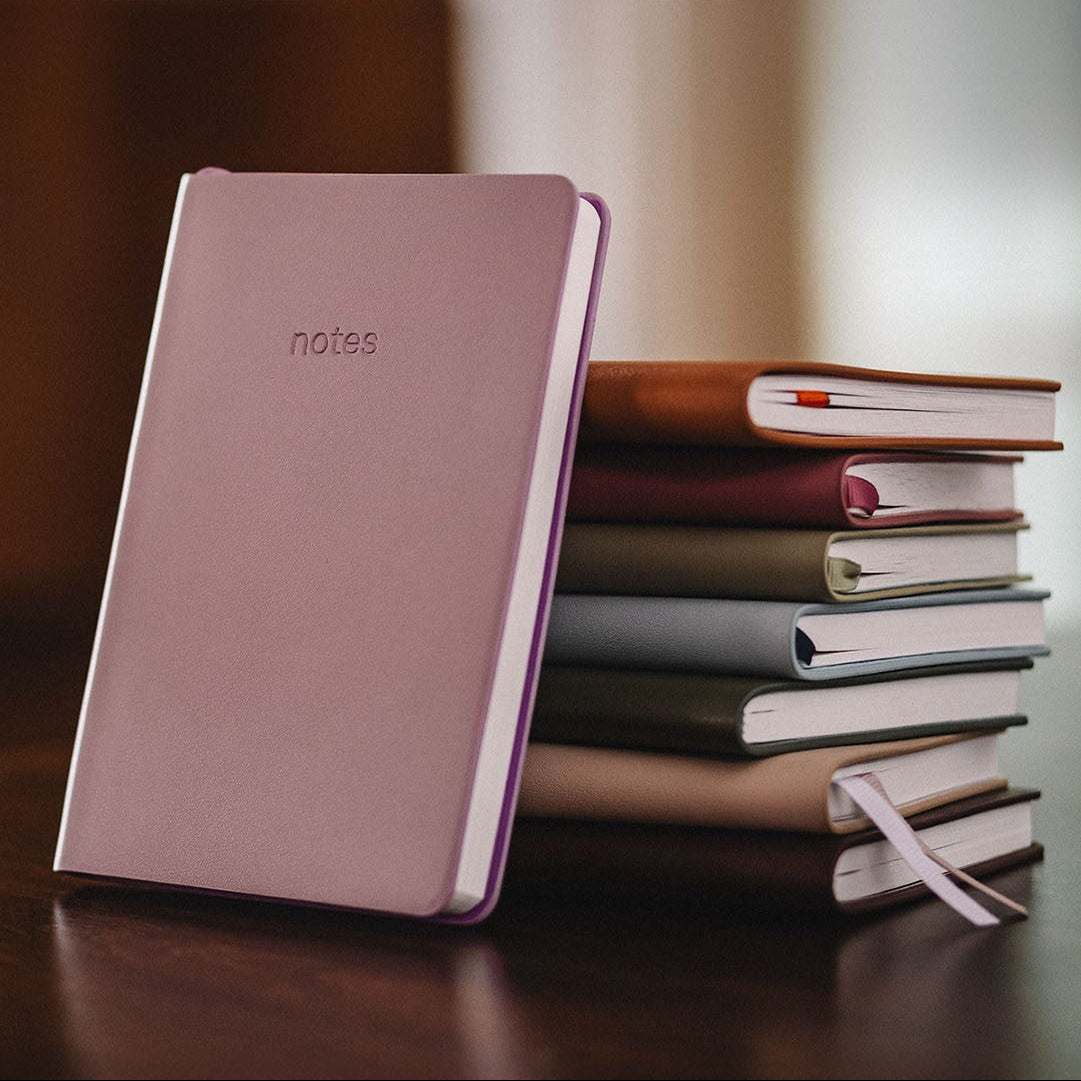 Stack of vegan leather notebooks