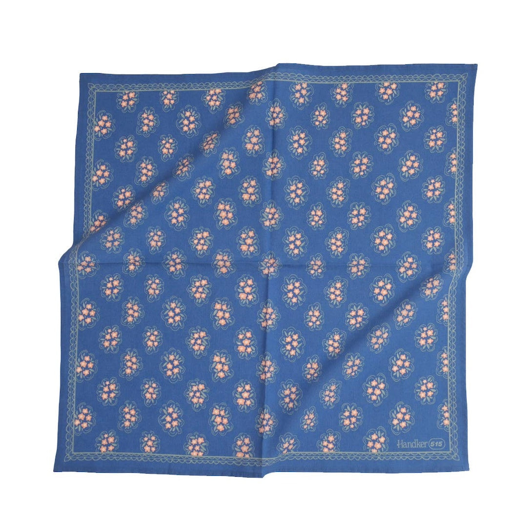 blue bandana with pink flowers on a white background