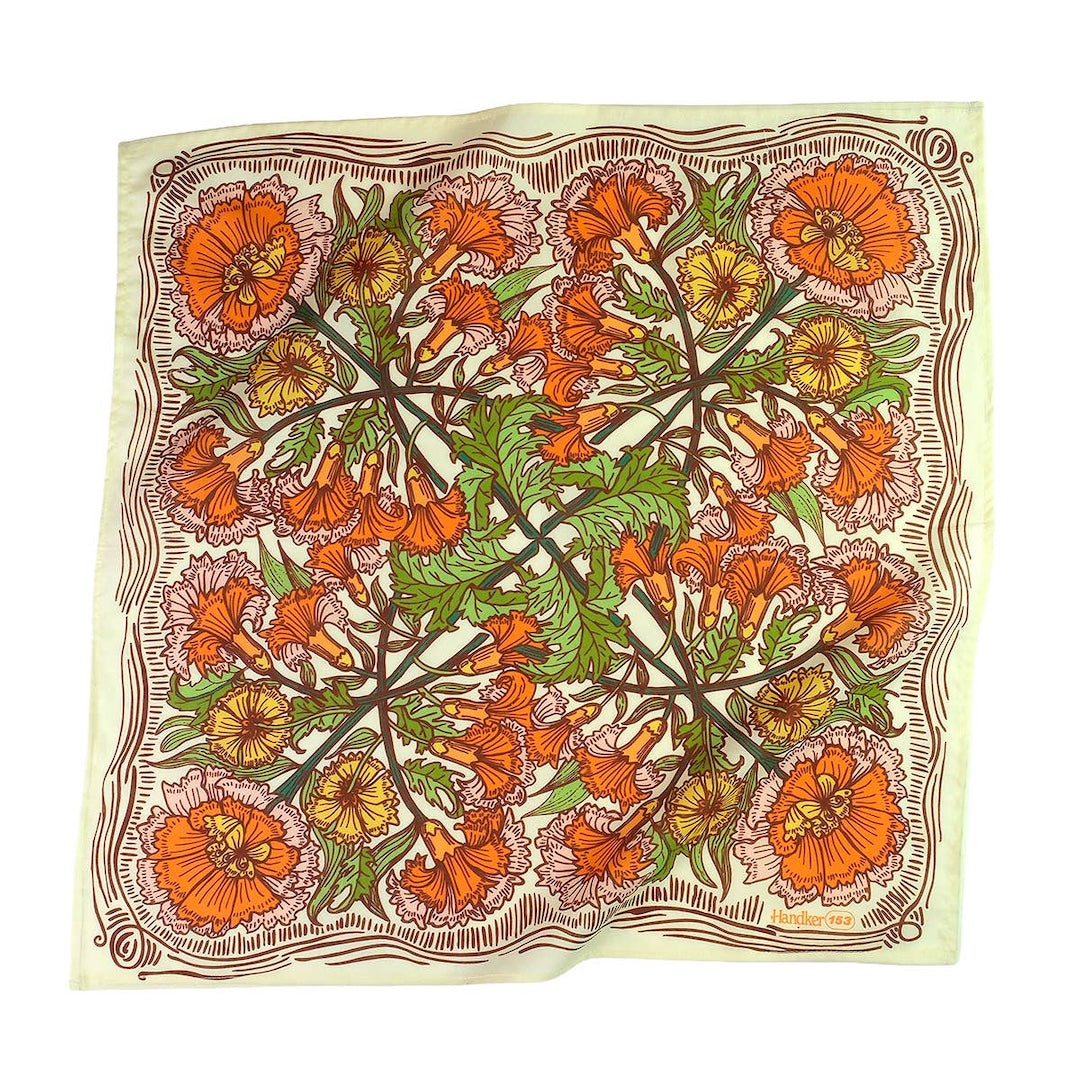 Poppy patterned bandana with orange, green, and brown colors on a white background