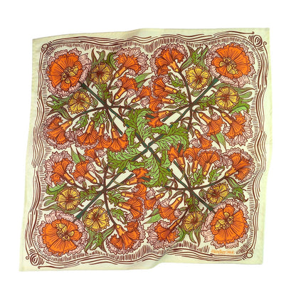 Poppy patterned bandana with orange, green, and brown colors on a white background