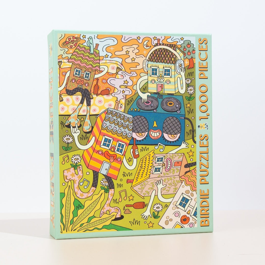 Colorful puzzle box with cartoon houses having a party 
