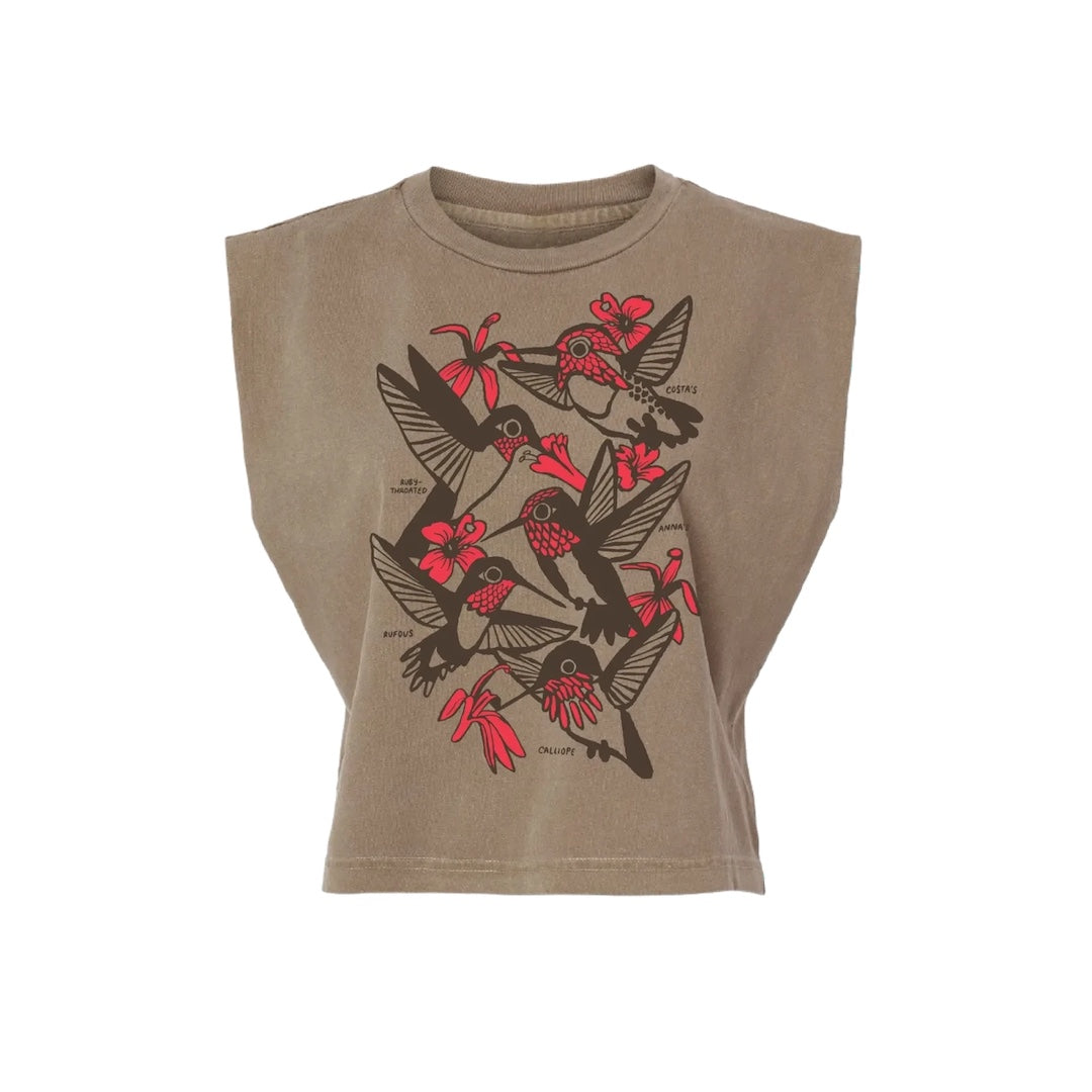 A sleeveless cropped t-shirt in a washed tan/khaki color, featuring a graphic print of hummingbirds and red flowers in black and red.