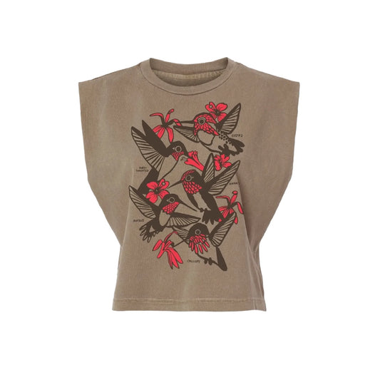 A sleeveless cropped t-shirt in a washed tan/khaki color, featuring a graphic print of hummingbirds and red flowers in black and red.