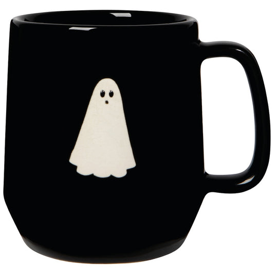 Black mug with a white ghost design on a white background
