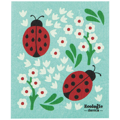 blue swedish dishcloth with a lady bug and floral design on it