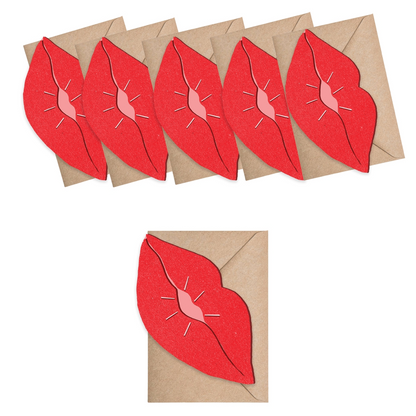 Lip shaped cards with brown Kraft envelops on a white background