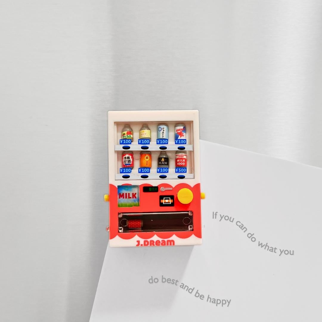 Miniature vending machine magnet on a fridge