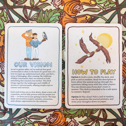 Two printed cards with rounded corners displayed on a colorful illustrated background. The left card is titled 'OUR VISION' with a short text prompt about conversation and connection.