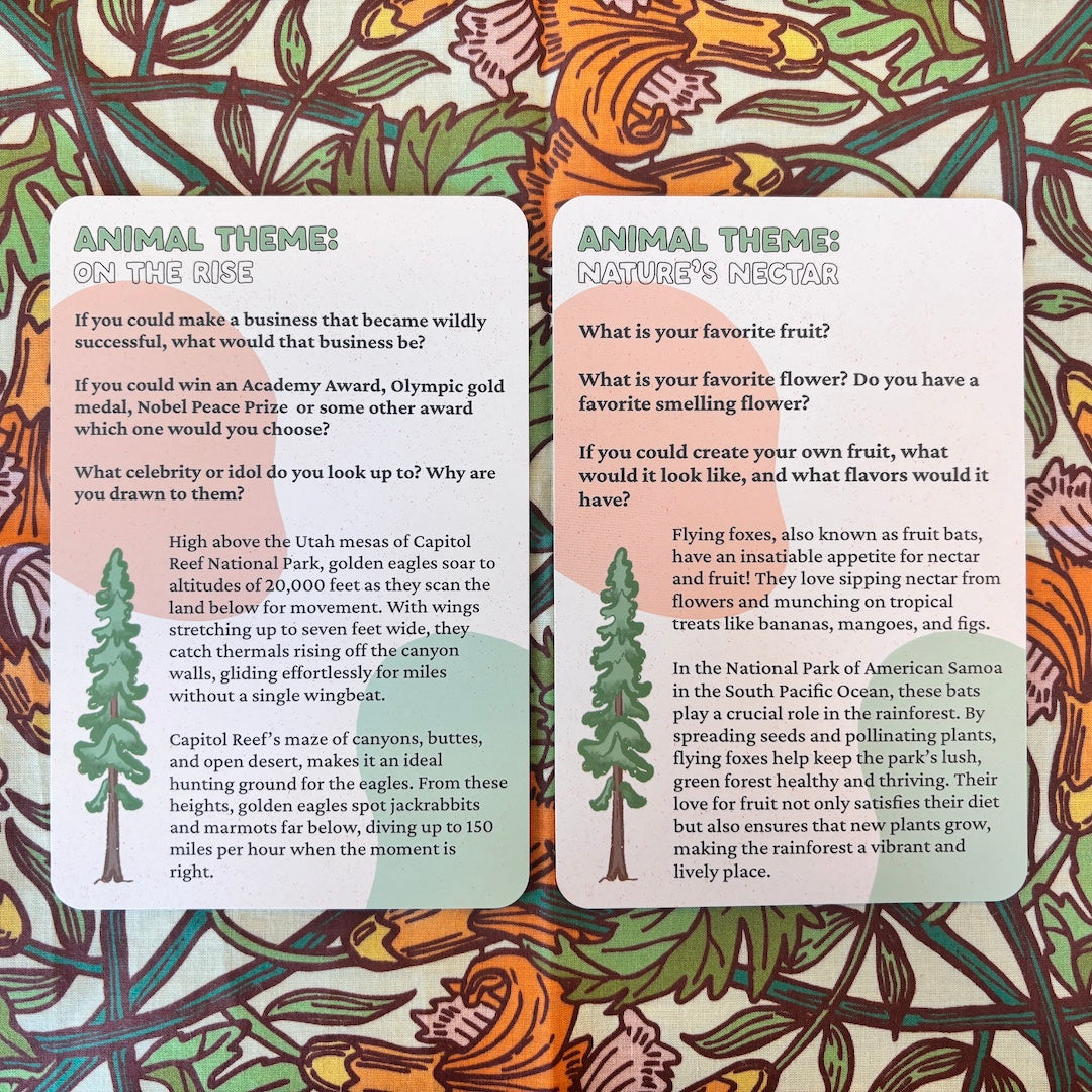 Two vertical printed cards with the heading 'ANIMAL THEME: ON THE RISE' and 'ANIMAL THEME: NATURE'S NESTAR,' filled with colorful illustrated text and surrounded by a swirling orange, yellow, and blue patterned border.