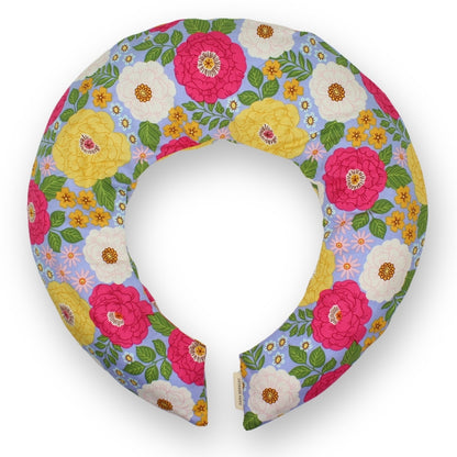 Floral-patterned neck pillow on a white background