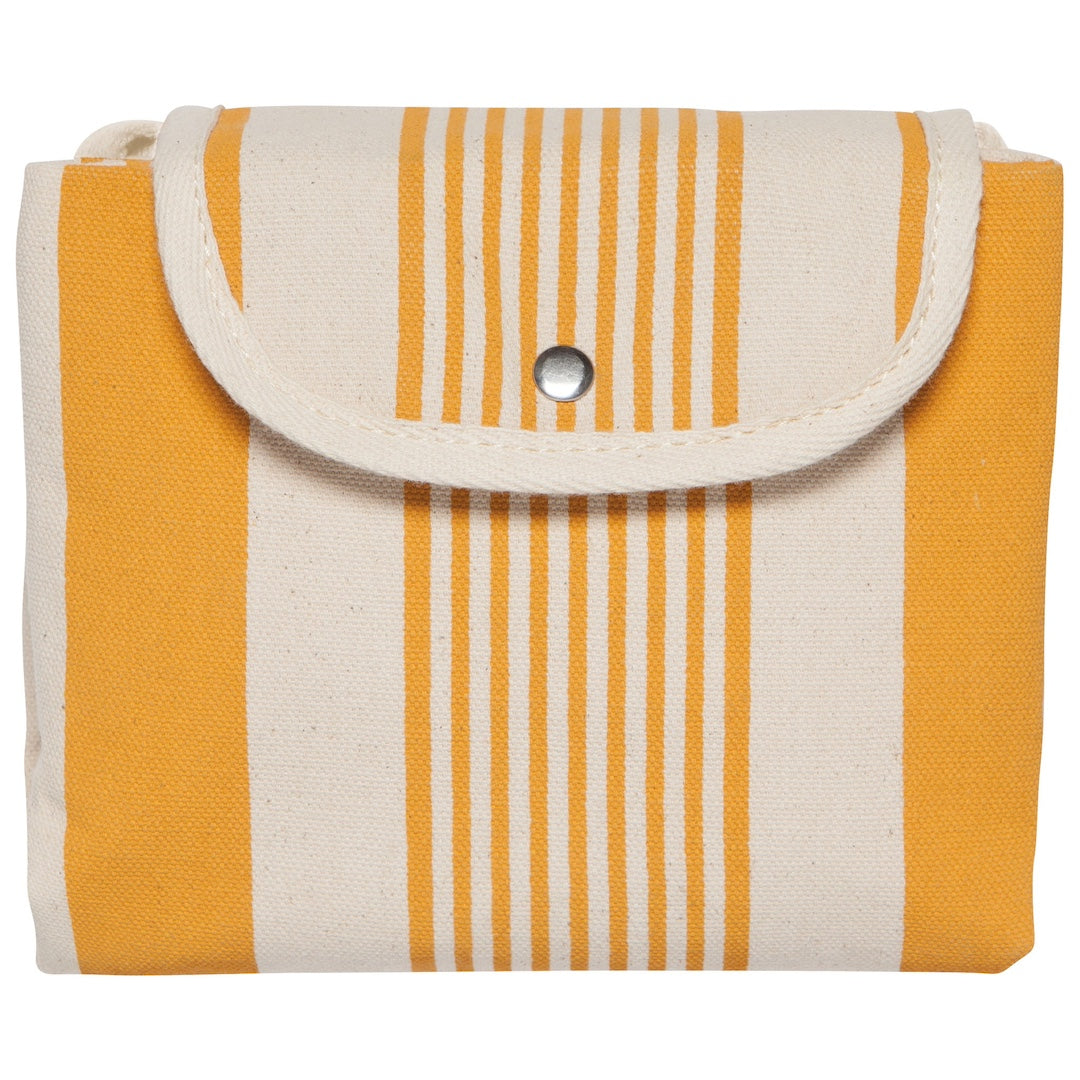 Yellow and white fold up tote that has been folded up and buttoned shut on a white background