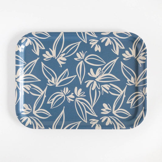 Blue tray with white floral pattern on a white background