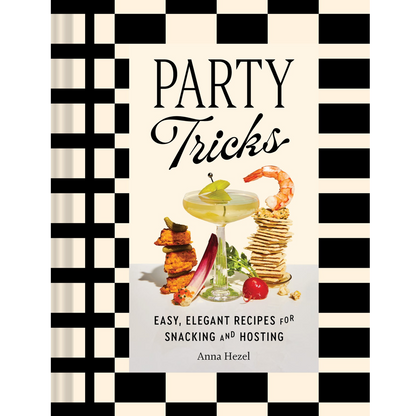 Book cover for 'Party Tricks: Easy, Elegant Recipes for Snacking and Hosting' by Anna Hezel, featuring a black and white checkered border, bold black title text, and a central food and drink illustration.