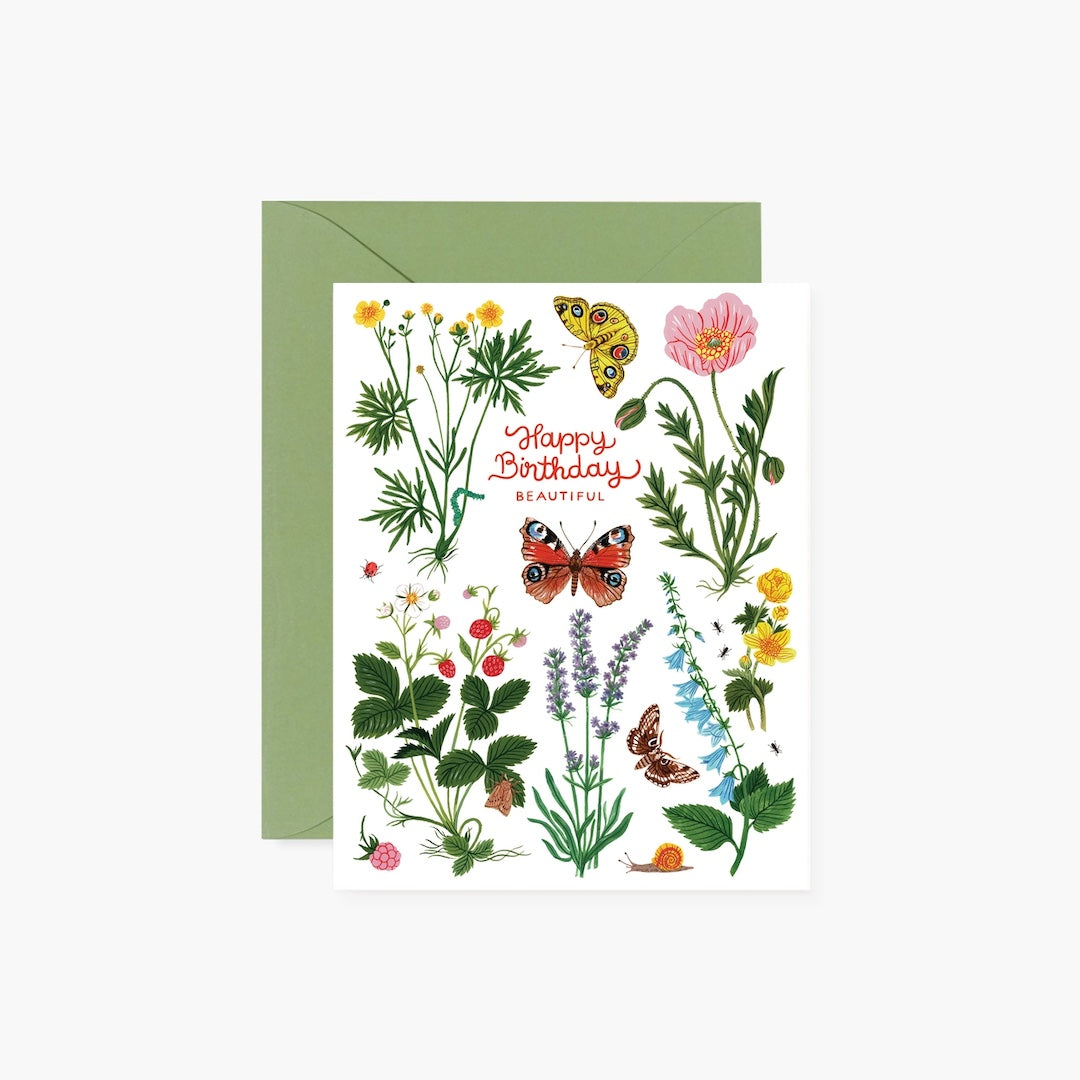 Greeting card with floral design and butterflies on a white background. Text reads "Happy Birthday Beautiful"