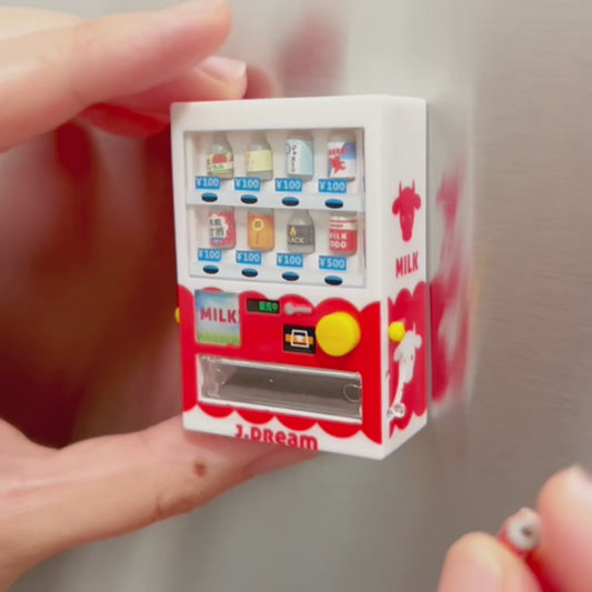 Video showing someone loading a small fake soda into a vending machine magnet then the person shows how you press the button to vend the soda from the machine