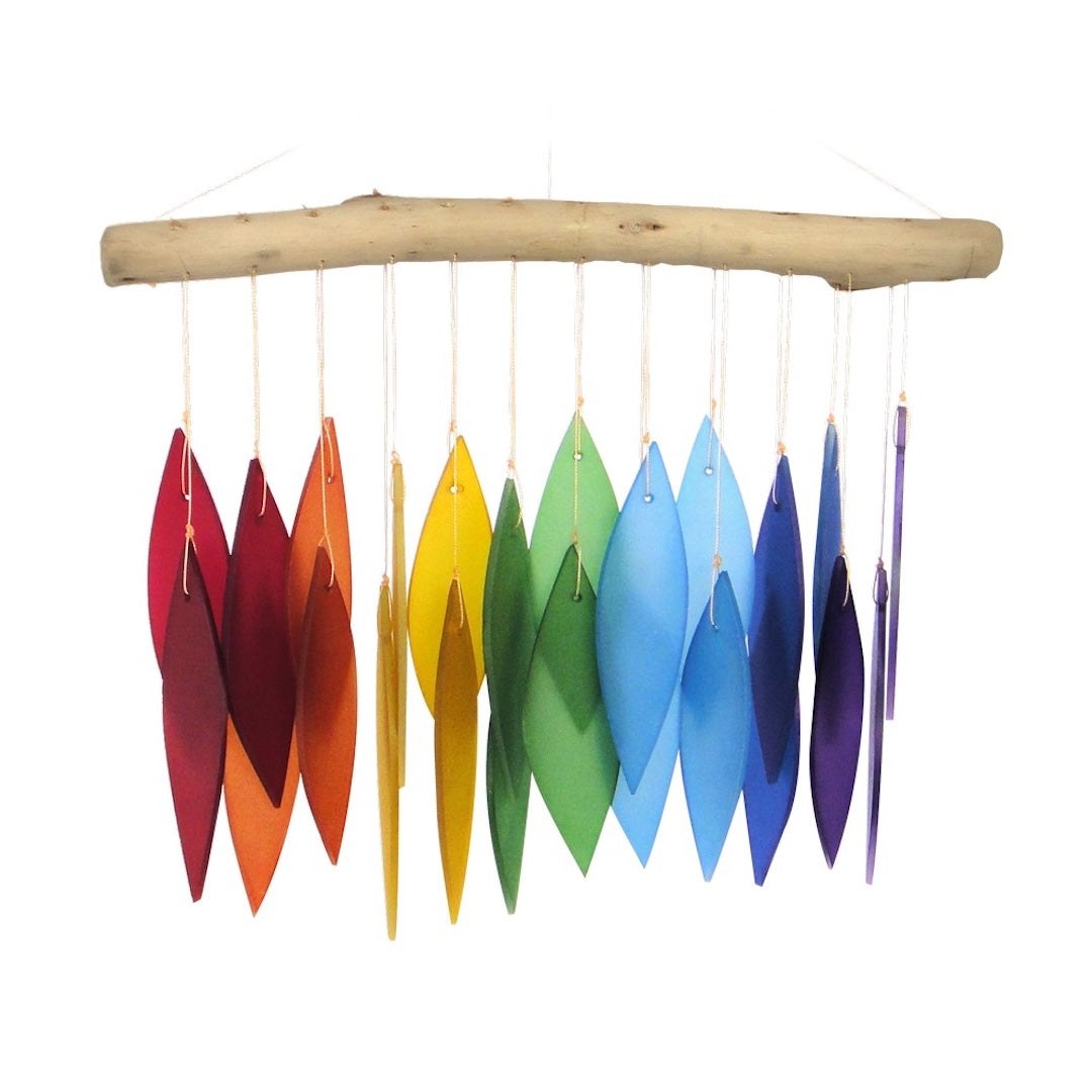 Wind chime with feather shaped rainbow glass pieces attached to a piece of driftwood