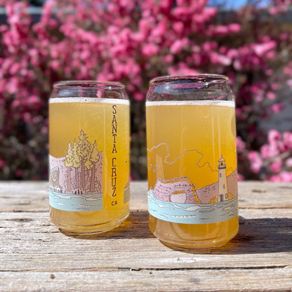 Two glasses with a colorful illustration of Santa Cruz landmarks. 