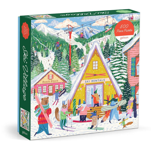 A 500-piece jigsaw puzzle box by Galison titled ' ski Village'. The box features a colorful, whimsical winter illustration of a ski resort with people, animals, chalets, and skiers.