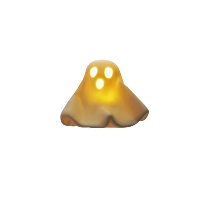Glowing ghost-shaped object on a white background