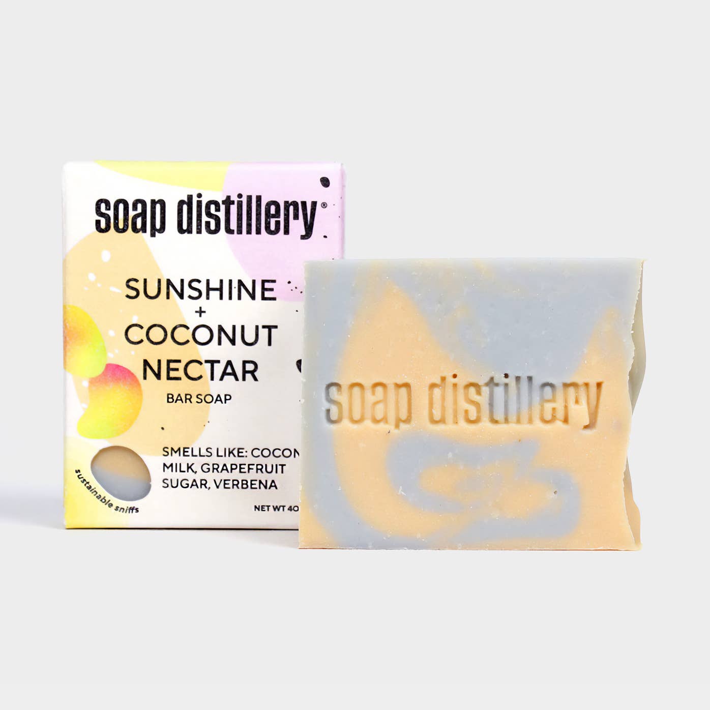 Soap Distillery Sunshine & Coconut Nectar bar soap with packaging on a white background