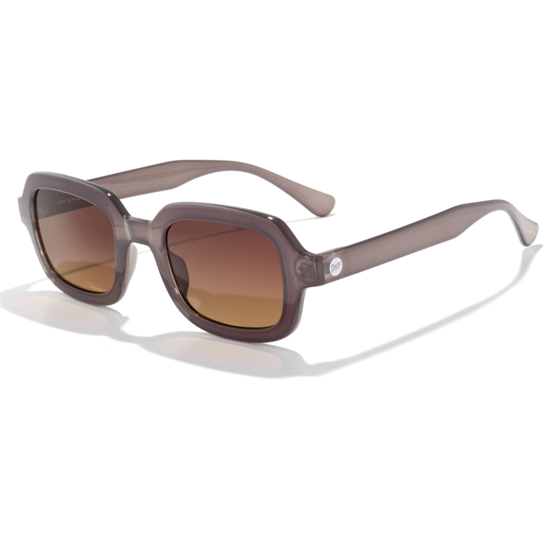 Oversized square sunglasses with a translucent smoky brown frame and brown gradient lenses, shown on a clean white background with a soft shadow.