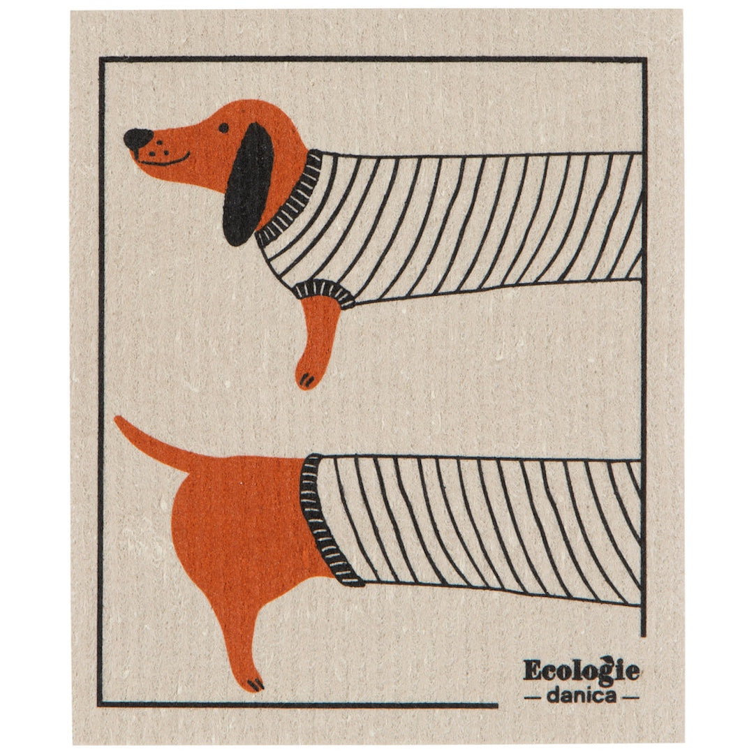 Illustration of a dachshund wearing a sweater on a beige swedish dishcloth with 'Ecologie danica' branding