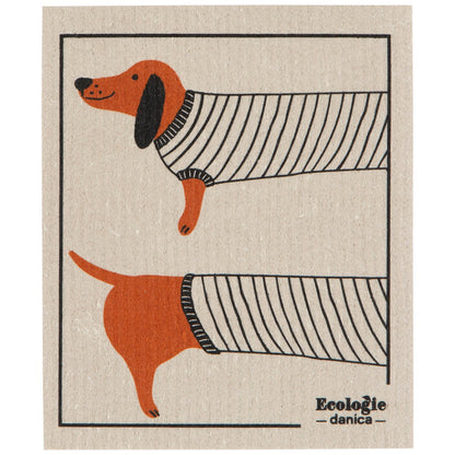Illustration of a dachshund wearing a sweater on a beige swedish dishcloth with 'Ecologie danica' branding