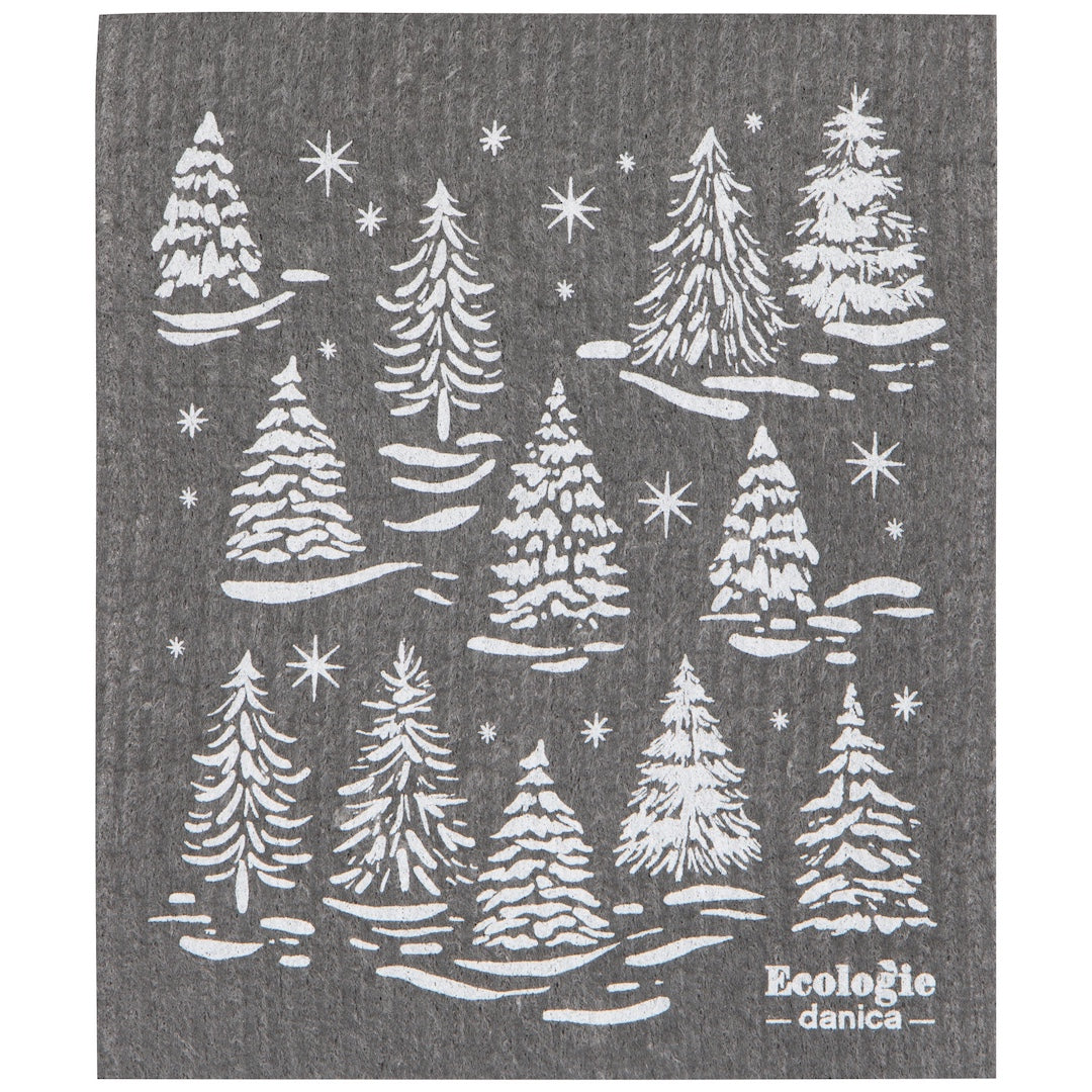 A dark gray swedish dishcloth featuring a white printed pattern of pine trees in a snowy landscape with stars. The brand name 'Ecologie - danica' is printed in white in the bottom right corner.