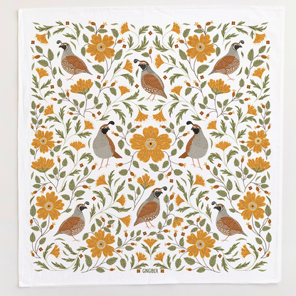 A square white textile featuring a repeating floral and bird pattern with orange flowers, green leaves, and brown-and-gray quail birds. 