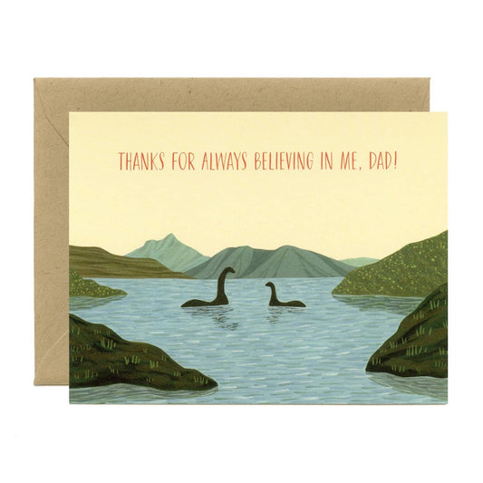 Greeting card with illustration of two Loch Ness monsters and mountains, with text 'Thanks for always believing in me, Dad!'
