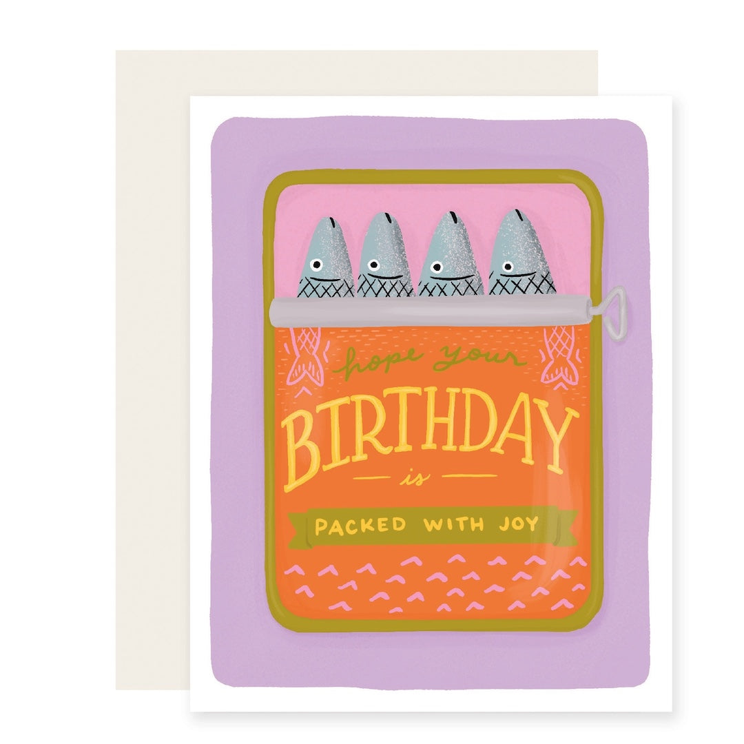 Greeting card with an open can of tinned fish that reads hope your birthday is packed with joy