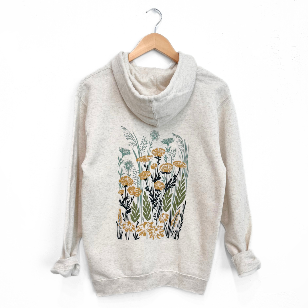 heather white hoodie with floral design on a white background