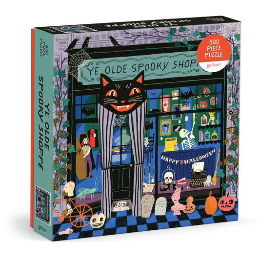 Puzzle box with a Halloween-themed design featuring a black cat and shop window.