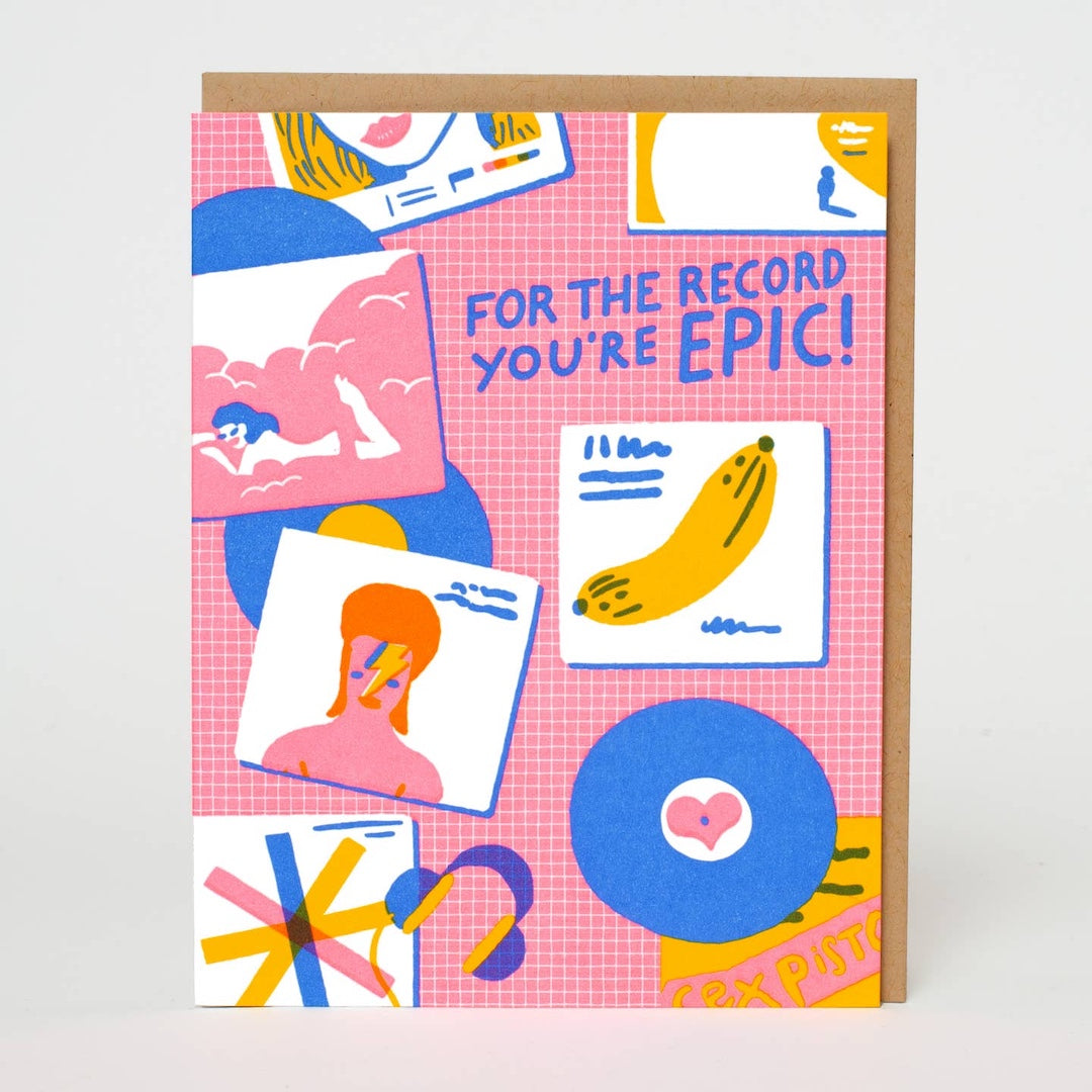 A square greeting card with a kraft envelope, featuring a pink grid background and colorful retro-style illustrations including vinyl records, headphones, and text that reads 'FOR THE RECORD YOU'RE EPIC!'.